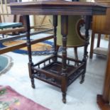 An Edwardian mahogany octagonal side table, raised on slender, ring turned legs,