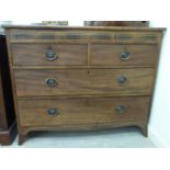 A George III mahogany and ebony string inlaid dressing chest,