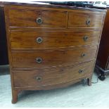 A mid Victorian mahogany bow front dressing chest with two short/three graduated long drawers,