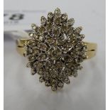 A 9ct gold marquise design diamond cluster ring 11