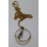 An 'antique' 9ct gold open framed, stone set pendant,