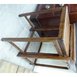 A nesting pair of mid 20thC Chinese fruitwood occasional tables, each with a carved frieze,