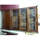 An early 20thC mahogany Globe Wernicke four-section bookcase,