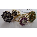 Four dissimilar 9ct gold gem set dress rings 11