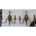 A pair of early 20thC neo-classically inspired gilt metal,
