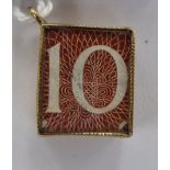 A 9ct gold framed pendant charm,