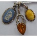 Three dissimilar pendants,