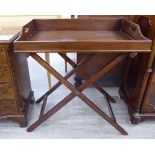 An early 20thC mahogany butler's tray 18'' x 30'' with a gallery incorporating opposing handles,