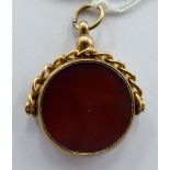 An 'antique' 9ct gold swivel seal,