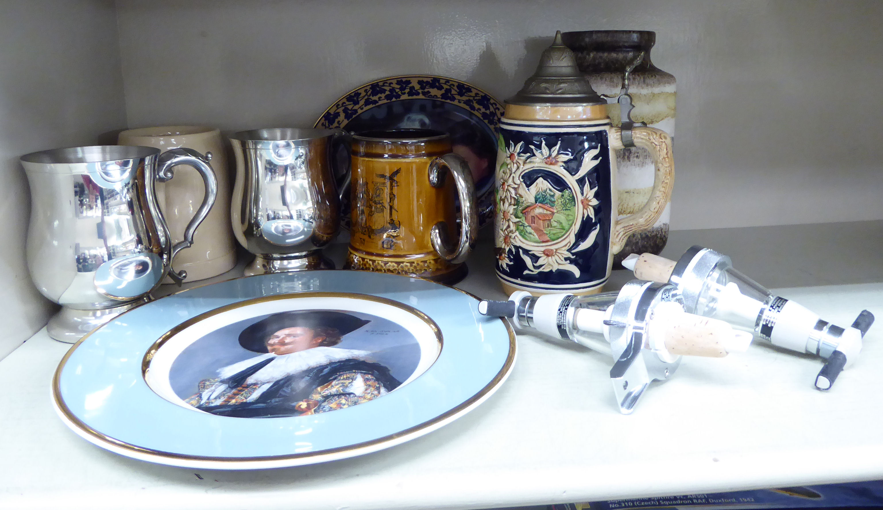 A mixed lot: to include a pair of modern stainless steel tankards;