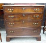 A George III mahogany dressing chest with four graduated long drawers,