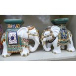 A matched pair of modern painted ceramic stands,