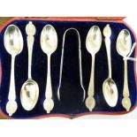 A matched set of six late Victorian silver teaspoons with bright-cut engraved stems;