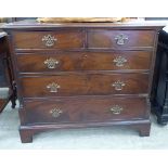 A George III mahogany dressing chest with two short/three graduated long drawers,