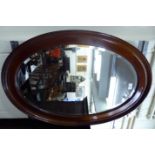 A 1920s mahogany framed mirror,