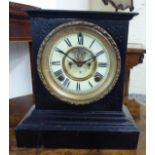 An early 20thC black painted, cast iron cased Ansonia mantel clock with straight sides,