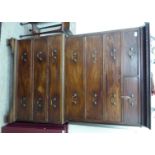 A mid 19thC mahogany chest-on-chest, having a dentil moulded cornice and canted corners,