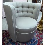 A Lindley grey fabric button upholstered swivel easy chair,