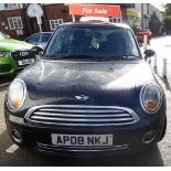 A 2008 Mini One three door hatchback, in black livery, 1397cc petrol, manual gearbox, approx.