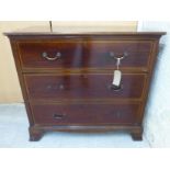 An Edwardian mahogany three drawer dressing chest,