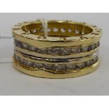 A Bvlgari style 14ct gold ring,