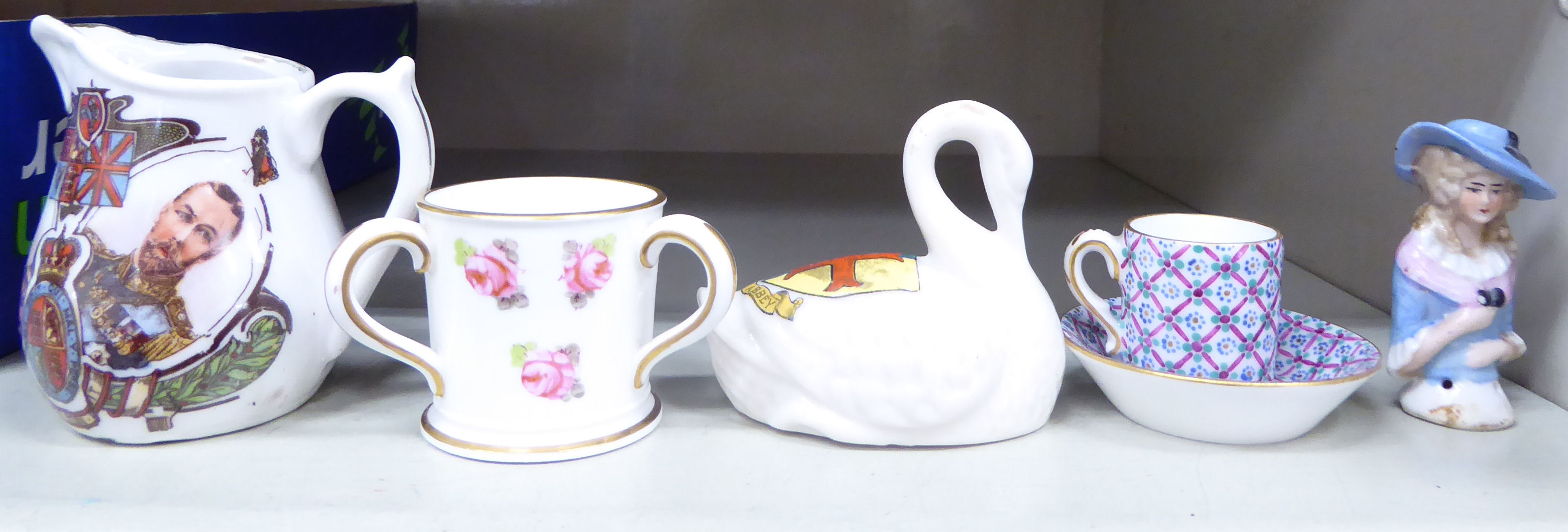 Miniature ceramic ornaments: to include a Sevres porcelain cup and saucer;