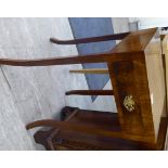 A 1930s Art Deco walnut veneered bedside table with a single drawer, raised on square,
