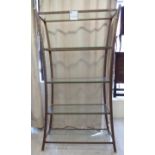 A Pierre Vandel speckled bronze finished, steel framed display unit of waisted form,