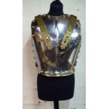 A Household Cavalry style polished steel and brass cuirass with shoulder scales