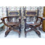 A pair of 19thC Savonarola inspired mahogany open arm chairs,