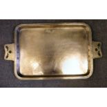 An Arts & Crafts Birmingham Guild of Handicraft spot-hammered copper tray with a raised border,