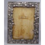 An early 20thC Japanese white metal photograph frame,