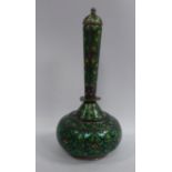 A Middle Eastern silver coloured metal and cloisonne vase of squat, bulbous form, the long, narrow,