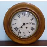 A late 19thC oak cased wall timepiece with a turned surround;