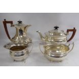 A four piece silver tea set of oval,