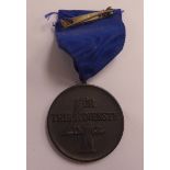 A German SS bronze 4 year medal,