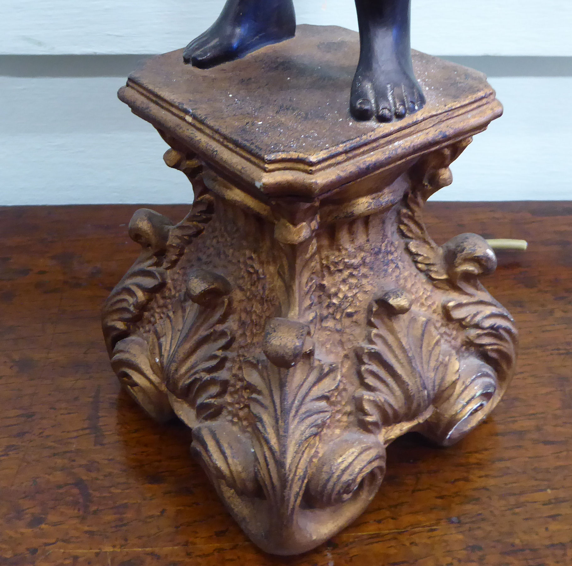 A 19thC style blackamoor table lamp, the standing figure elevating a cornucopia and four, - Image 4 of 5