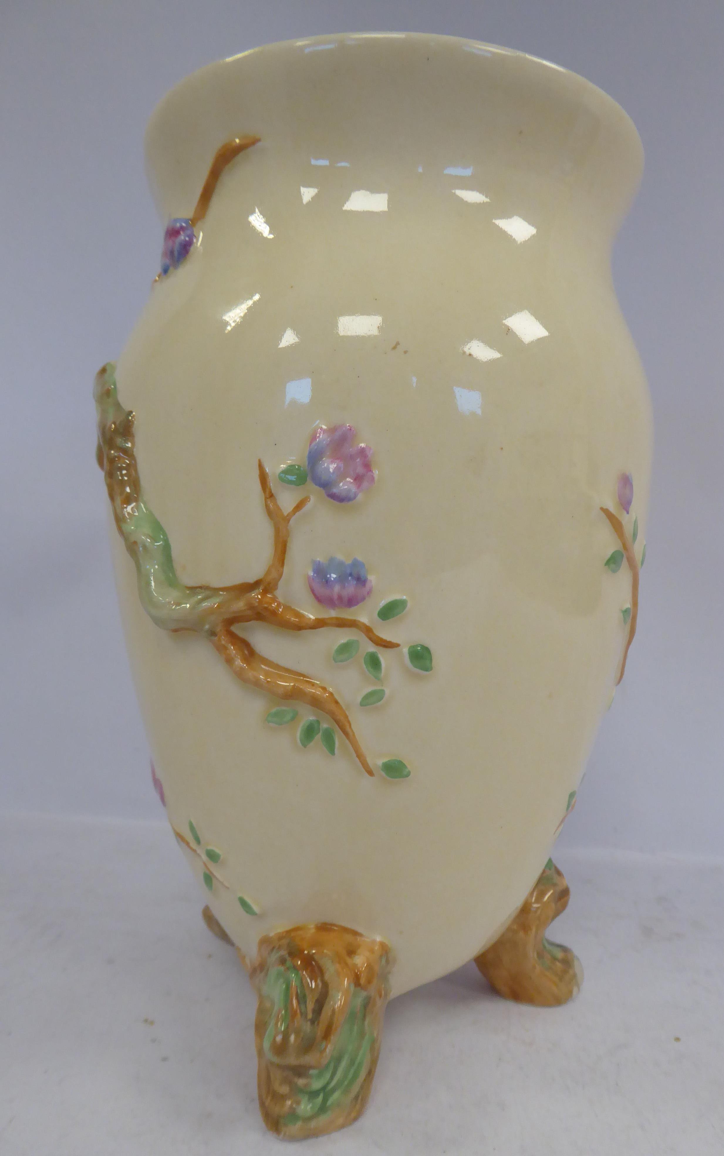 A Clarice Cliff cream glazed china vase of ovoid form, having a flared rim, - Image 2 of 5