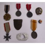 Various German military and associated insignia and medals: to include The West Wall Defence Medal,