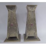 A pair of Arts & Crafts spot-hammered and rivetted,