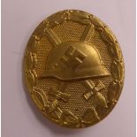 A German Wound badge, in yellow metal,