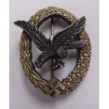 A German Luftwaffe badge, stamped GH Osang,