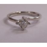 An 18ct white gold claw set princess cut diamond ring (with a diamond grading report)