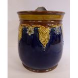 A Royal Doulton blue and two tone brown glazed stoneware tobacco jar of tapered, bulbous form,