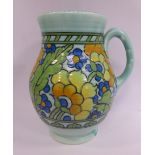 A Charlotte Rhead Crown Ducal pottery jug of ovoid form, having a loop handle,