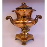 A late Victorian copper and brass samovar with opposing, scrolled handles,