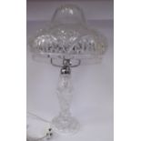 A mid 20thC slice decorated crystal table lamp,