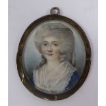 An early 19thC head and shoulders portrait miniature,