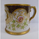 An early/mid 19thC porcelain mug, having straight sides and a loop handle,