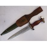 A German student's dagger with a moulded wooden handgrip, the blade 8.
